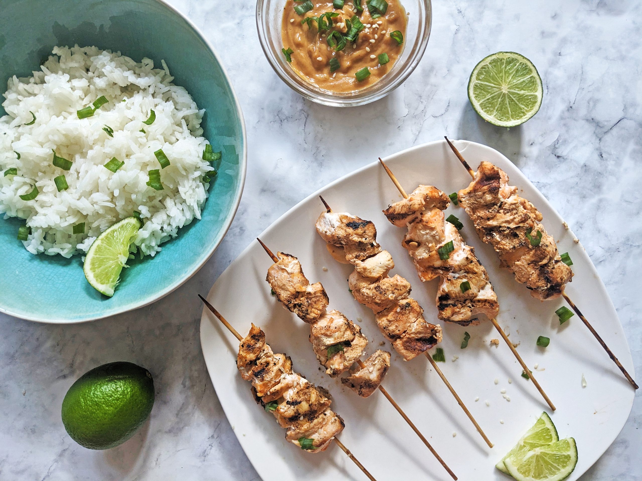 chicken satay with rice and peanut sauce